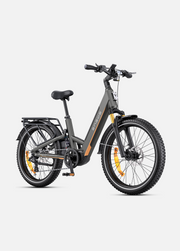 A dark gray step-through electric bicycle with orange accents and black tires, shown from a three-quarters front angle on a light gray background.