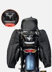 Motorcycle with a black backpack and additional gear on a white background