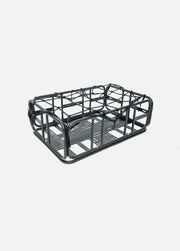 Black metal wire basket on a white background