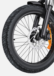 Close-up of a bicycle wheel with disc brake on a white background