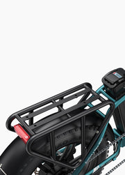 Black bike rack attached to a bicycle on a white background