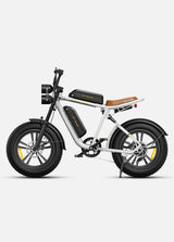 White electric bike with black tires on a light gray background