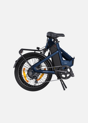 A navy blue and black OVO folding electric bicycle with a rear rack, fenders, and a black battery pack mounted on the frame, shown on a light gray background.