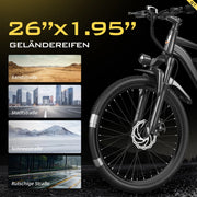 Bicycle with 26x1.95 tires on a black background with road scenarios displayed.