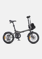 Green folding bicycle on a white background