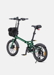 Green folding bicycle on a white background