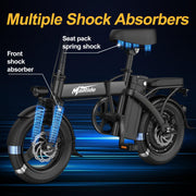 Black folding electric bicycle with blue highlighted shock absorbers and labeled callouts including 'Multiple Shock Absorbers', 'Front shock absorber', and 'Seat pack spring shock' on a dark blue graphic background.